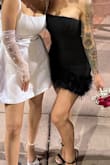I love the dress, although it fit perfectly on the top around the bottom was a little tight due to their being no stretch from Feathers that were attached to the rope around the dress. Made some altercations and it's still looked amazing, and I got tons of compliments. The wedding was in Vegas, so it fit perfect! - Cristina I.