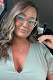 Showed a whole lot of cleavage so I did have it tacked a little :) It was super long, though...even with heels. - Shelly F.
