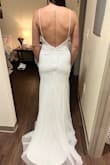 I really loved this dress but it wasn't the ONE. It fit me really good and it was very easy to move it. My only issue was the sequins kept falling off and the boob area was huge. I absolutely loved the back - Kasey M.