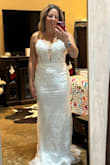 This was a gorgeous dress and it fit perfectly! The only thing I didn't love was the glitter. The open back was very cute! Ultimately, I decided on a different dress, but this definitely doesn't disappoint! - Tiffany C.