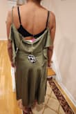 This dress's cut was way off. I'm not sure how to make of this. Enclosed are some photos - Maltie K.