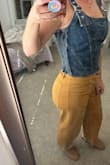Snagged this because it's simple enough for my wardrobe to go with a lot of things, but also adds a spice with it being denim and the buckles. I would recommend it, it's got some stretch on the sides, and has a high neckline for me at least that doesn't show cleavage. - Brandie R.