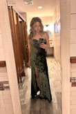 Got so many compliments on this dress! It was a few inches too long, so I pinned it. The material is beautiful and the top stays up easily (I'm a full B). Material isn't compressive so I wore Spanx for a smoother look. Was definitely giving Old Hollywood glam! - Cait B.