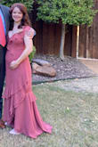 I wasn't sure what measurements to put bc I am 20 weeks pregnant, but this dress saved my butt. I am usually a Small (34B, 125lbs, 27 waist) but since hitting 19 weeks, I sized up one. Aside from needing to shorten the straps (which prob raised the waist an inch) and wear heels, this was great. Could have used hemming, but I didn't make time. I would call it bump friendly prob for another couple of weeks which is pretty good! I am tempted to buy it in my regular size to have on hand! - Marlane B.