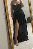 The cups were too small and the back weirdly bubbled out. The buttons that connect in the back seem a little flimsy - Madison D.
