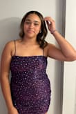 My daughter wore this to her school homecoming dance. Appropriate length for a younger girl but can be made shorter for a different look. - Michelle F.