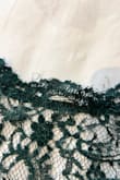 I expected good quality; the back little hook came unstitched; the lace part looks bad. For the price I paid, I can get something better on a different store. - Lisseth F.