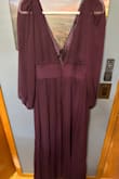 The dress is beautiful and the quality is definitely worth the risk of ordering a dress online. The style is flattering for my body type. I did have to steam it to get the wrinkles out, but the end result shows the quality even more. The dress is a true purple, don't be fooled by the picture due to lighting. - Tiffanie P.