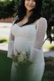 Wore this dress for our elopement at 23 weeks (almost 6 months) pregnant! It was perfect as it was flowy enough to not constrict my bump. With the bump, the medium size was great. - Lesly R.