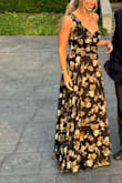 Got so many compliments on this dress all night long. Felt supported with just one strap; didn't have to wear a strapless bra, and it was so comfortable and flattering! I did get it hemmed about 2 inches to wear with 3-inch heels - Casey L.