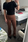 Nice stretchy material. Cute work top, seems versatile, love it - Savanna H.