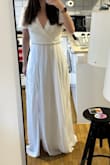I loved this dress on the site, looks so elegant! But on me, it looks a little strange; the waistline is a little tight for me (if you have a wider ribcage, this might be your issue too), and it's definitely too long so I have to have it hemmed. Since it is mostly polyester, it needs a good ironing and might be a little hot for a summer wedding. It looks a little plain from the front so I added a belt. Overall good, but I'm not sure if this will be the dress for my wedding. - Lilla S.