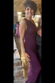 I wore this outstanding dress to my cousin's daughter's wedding, and it was AH-mazing!! Fit like an absolute glove; the fabric is rich & luxurious and SO COMFORTABLE! The dress runs long - I am 5'6 and wore 4.5" heels, and it covered a lot of my shoes but not all. I did have to pin the one side under my arm opposite the shoulder that's covered to not show my bra as it's cut lower there, but was super easy to do and was not visible at all. Highly recommended this dress, got soooo many compliments and hope to have an occasion to wear it again!!! - Deanna D.