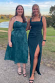 Loved this dress! The color was perfect and the material fit super well. I only had two concerns. The slit was too high up so I had to use a safety pin. Since the sleeves weren't adjustable, they kept falling off my shoulders. Both concerns could be fixed with safety pins. Overall, I'd recommend this dress. The scrunch towards the stomach area was very flattering and made me feel more comfortable even after bloating from all the food I ate. - Amanda L.