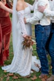 This dress was absolutely beautiful. I bought it for my wedding wanting something on the cheaper side, and you can't even tell! I wasn't a fan of the sleeves being attached. I felt like I couldn't move my arms so I did have it altered and detached, but other than that, it was so perfect!! So in love with this dress - Madison G.