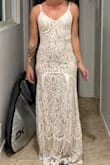 This was the dress I thought for sure was it. And could be, maybe, if I size up to a medium. But the medium is sold out so I'm sol atm. It's beautiful and simple, and I think the slight train and back is stunning.
No stretch, so if you're between sizes, I would recommend sizing up - Hannah R.