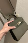 Matches H Kelly bag style to a T. Fits my work and personal phone along with my wallet just fine. An absolute steal. - Carley J.