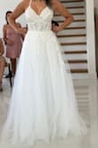 I absolutely loved this dress and felt like a princess in it. The details were stunning and the dress felt like good quality. I didn't pick it to be my wedding dress only because I fell in love with another Lulus wedding dress. - Gabriela G.