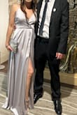 This dress is absolutely stunning! In the picture it looks "meeh" but when I tried it on I felt like a princess. Super comfortable and elegant. It runs very large if you're not that tall but I didn't care. Great deal and super elegant fabric. It looks silver but it also can have "lilac tones" with certain light. Loved it! - Laura J.