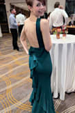 I absolutely love this dress! It's super sophisticated and I felt so sexy in it. I'm not the type of person that buys clothes with bows but for some reason, I ignored my no-bow rule and bought it. I originally ordered it in an XXS, but it was just a little too tight in my hips/legs so I ordered an XS and ended up keeping that. I was worried because I'm smaller in the chest but it actually fit better than the XXS did. - Julie P.