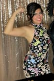 The material does not stretch, length is perfect if you are going for the long gown look. (Note: I was wearing 4 inch heels) The slit in lower back is perfect. It was a little loose in the chest area. Overall it was a perfect fit!! - Evelyn E.