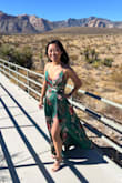 I got this dress for a wedding. It's stunning. I'm very short. So I had to get the bottom tailored like 6 inches and also wear heels and had the slit moved up higher. The green is so pretty and I got so many compliments! - Cookie J.
