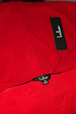 I usually wear a Large in Lulus, but after reading some reviews, I decided to get a medium. I'm glad I did. I think I could've even gotten a small though it may have been too fitted. I love how it fits. I just tried on because my event isn't until December. My chest is on the smaller side so there is a bit of room there but it's nothing too noticeable. The length is great and there aren't any zippers which suits me great. The jumpsuit has stretch too hence why I sized down. I would recommend this if you wanna try something a bit daring. I'm moving out of my comfort zone with this outfit and I'm excited! - Candice K.