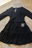 This dress was THICK. Would definitely be warm. It was a really cute style but had an elastic band around the waist that got easily twisted. There was much more dimension to the dress than I expected - Michel P.