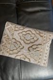 I absolutely love the look and style of this! It's stunning! I was disappointed with its durability. I used it once at a wedding and barely touched it once it was at my table and some of the beading had fallen off. Disappointed because I do love it and want to use it again, but it is definitely missing beads. - Lauren F.