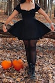 I love the corset. The dress is pretty comfortable. Fit true size. - Indira V.