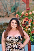 Wore this to a fall wedding and the colors were perfect. The fabric has absolutely no give at all. It fit my bust and back perfect but was definitely snug on the butt and hips. It had a slit which gave me a bit more room but it did make the slit gap more than I would have liked. If you're curvy, definitely think twice or buy the next biggest size and get it taken in; I was on a time crunch so I couldn't do that. Otherwise, very beautiful elegant dress; felt high quality. - Michelle F.