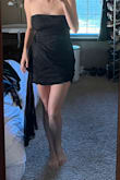 I ordered a large but I think I could have fit a medium a little better. I'm a new mom of twins and the draping of this is really flattering on the tummy area. My only negative comment is the material feels a little cheap. - Malory H.