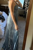 Love love love this dress. The fabric and style is so flattering even with it being too big. I ordered a large based on my dimensions with the size calculator but I should have ordered a medium for a better fit. Will be trying to exchange for a medium. - Malory H.