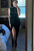 I love high neck dresses and the gathering at the waist helps flatter my postpartum body but I still don't feel awesome in this dress. The color is amazing and the thigh slit is perfect but I think the waist area makes me look bulkier than I am. - Malory H.
