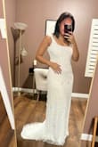 This dress is absolutely breathtaking in person!
The moment I took it out of the garment bag, I was in awe of its beauty and quality. It was the perfect choice for my Hawaiian elopement, complementing the tropical setting flawlessly. I did have it tailored to adjust the length, and the final fit was perfect. I couldn't be happier with how it turned out! - Antoinette A.