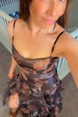 It is a gorgeous dress. I love the brown color and the flowers. The ruffles are just perfection and the openness on the side; it is so sexy. - Ingrid A.