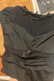 The fit is great. I can wear without a bra, and it's flattering. But it arrived with part of the mesh torn from the fabric. - Valerie L.