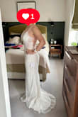 This is just the most beautiful dress and I felt 100% me and just beautiful in it.  Agree with other reviews that the glitter does fall off a lot so that is really the only downside (I am hoping it will not be too noticeable to guests or indeed an environmental disaster on the day).  I had bought four dresses to see which one worked best for me. By far this was the most flattering.  I did buy another lace up dress that was approx £200 more and side by side you could see that the other was more expensive, but the fit on that one wasn't as good.  It is a shame Lulu's do not have a version of this dress with a better quality bottom half and more of an obvious train as the glitter does catch a bit. That said, I truly felt amazing in it and so excited to wear it for the wedding. Thank you to the other brides who put pics up on their reviews as you really helped me decide which ones to buy and try! - Nicola P.