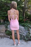 Loved the dress with a form fitting look. I was borderline between an XXS and XS and the XS was a great fit with the exception of slightly too big around bust leaving some winging of material in the back but not very noticeable. Fast shipping - one week from when order was placed. - Ella V.