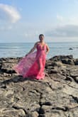 This dress was actually so perfect! I ordered it last minute for a wedding as I didn't have time to go shopping. The color was perfect! The bright pink was perfect for the beach wedding I attended. It definitely didn't give "neon pink" like some people said. But either way, the color was perfect. The flow of the fabric and slits were just perfect for the dress. - Alissya M.