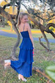 This stunning jewel tone dress was a perfect find when my daughter's school changed the dress code for her senior year HOCO. It fit her perfectly!! - Danielle T.