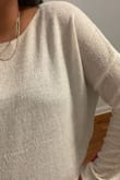 This light weight sweater is flattering and fits well. I am 5'10" and usually 185 lbs, right now closer to 210. It still fits nicely but the fabric is NOT comfortable on my skin. Even after washing (no dryer) it's still rough. The shirt is a bit sheer, which I did expect from photos, so it's alright when wearing a shirt underneath and this layered on top.
This would be a great year round piece and would be fine if you are not overly sensitive to fabric textures. I ended up gifting this to a friend because I had already cut the tags and worn it a couple times. She loves it & it's a pretty versatile capsule wardrobe staple, I just would not re order due to texture. I am very sensitive to fabric textures, if you aren't this is a nice piece and can dress up or down. Cute enough for work or a date night, and can be styled more casual for bopping around. The knit details are really cute! - Kristen