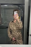 The color is a little darker than expected. Based on the pictures, I expected a more cream/light beige but still very cute! The material is light but soft. The fit is comfortable, even with my 15 week bump. The top has a loose/oversized feel and look. Overall a nice dress! - Hannah H.