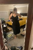 I love this dress! It fits perfectly and is true to size. It's comfortable and a great length! I usually steer clear of button-up items because I'm large in the chest, and they tend to pull at the buttons, but this doesnt at all. It fits perfectly in the chest and still fits nicely on my body without looking too baggy! - Bridget K.