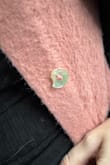 The fibers shed off this sweater like crazy. Also it came with a broken button - Bonnie K.