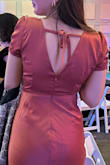 The dress fit nicely and was well made. I opted to have it hemmed and altered as the neckline fit a bit low on me. - Kerry R.