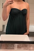 When I tried the dress on, I was worried it would wash away my curves but it ended looking great! The material is silky and a beautiful dark green color. It was a bit long for me even with 2" heels but manageable since I had no time to tailor it. I thought it would be a good idea to use fashion tape to pull the top part up more, but the tape I used didn't really work and just leaving it as is worked for me (keep in mind I have B cups). But overall loved it!! This dress got a billion compliments! - Stephanie E.