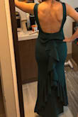 This dress is great! Fits so nice (true to size) and looks so elegant! A nice thick material feels super high quality, highly recommend! - Madison S.