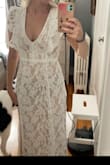 I love this dress. It is perfect for my wedding rehearsal dinner. I always order the size Lulu's recommends based on my past orders and returns, and this fits true to that. It came in a really nice garment bag, too...just need to wear lighter colored underwear! - Taylor O.