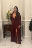 A little snug in the chest. Large would have been too big. Very classy and flattering on all figures. I had to have length shortened, otherwise beautiful dress! - Maria L.